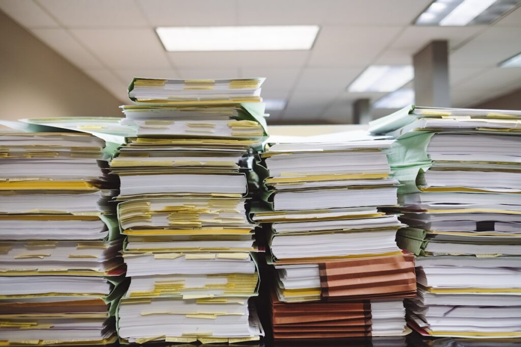 The January school fees paper pile