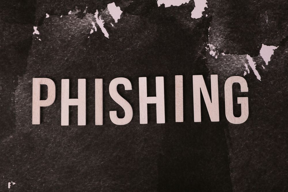 Laptop and online security warning on screen, a reminder to verify 1-hour payday loans lenders
