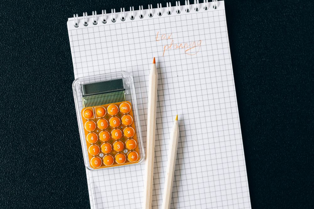 Notebook and charts used for financial planning