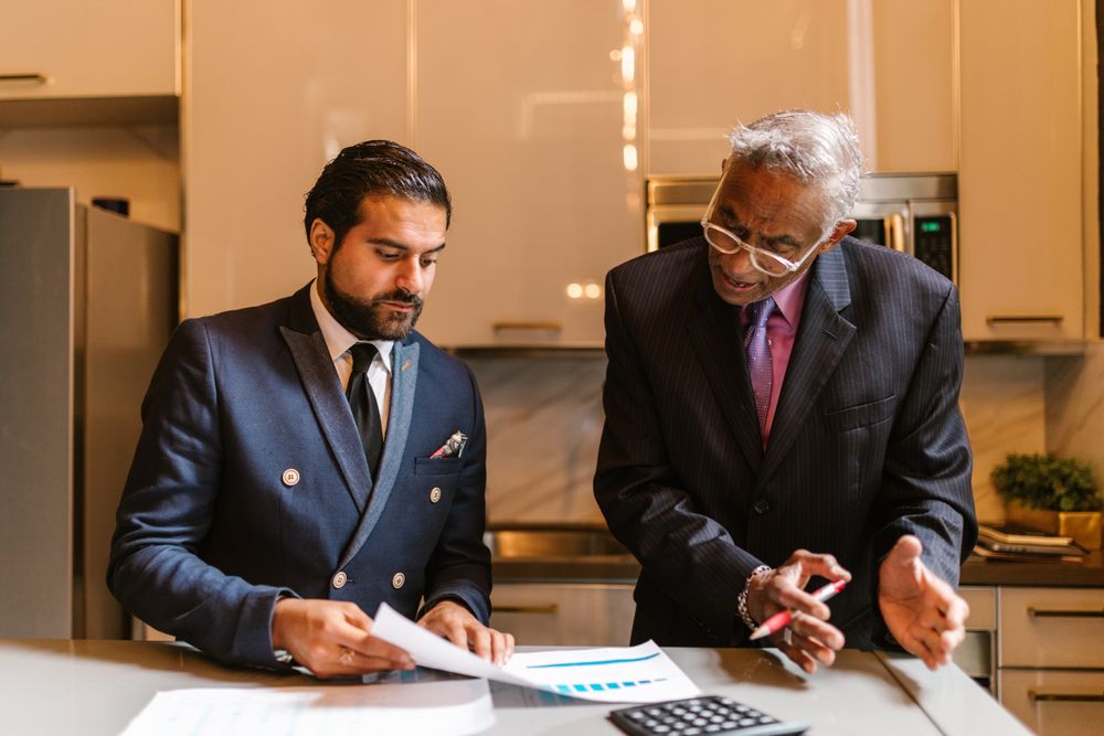 Client meeting with a financial adviser, explaining what a credit score means