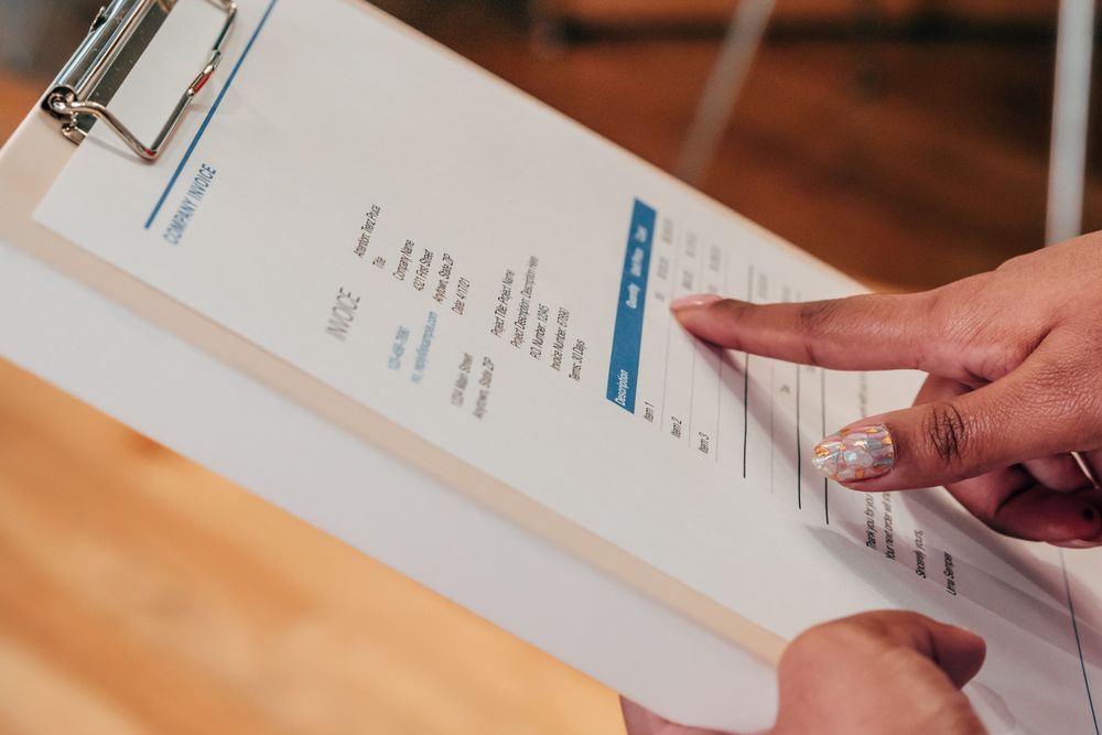 Invoices and paperwork being reviewed