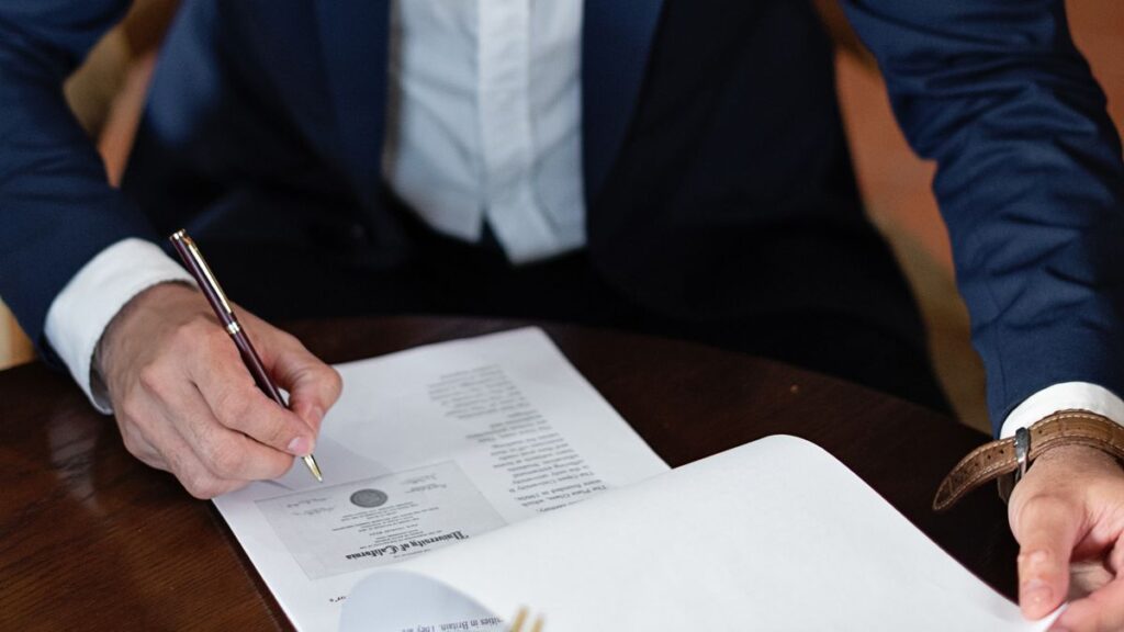 Person reading a credit agreement before signing
