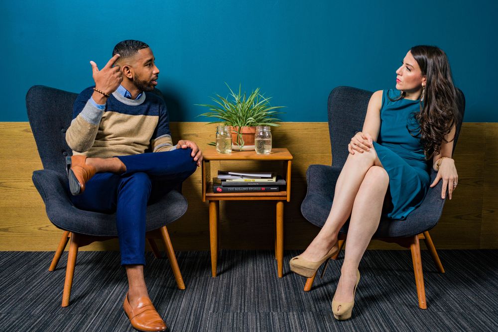 Two people having a serious conversation