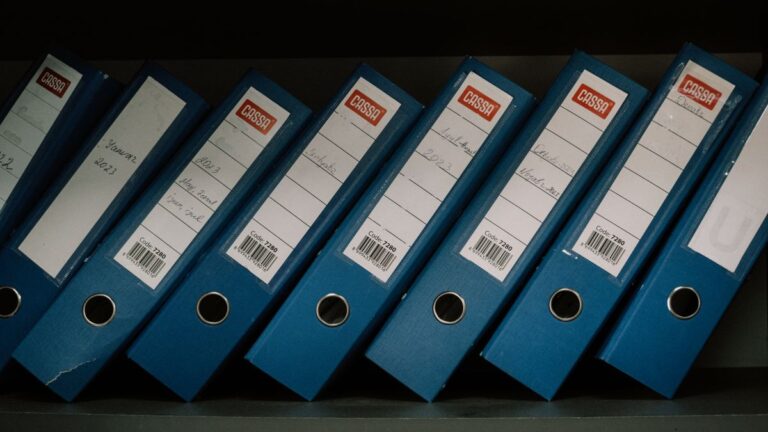 Folders and binders of financial paperwork