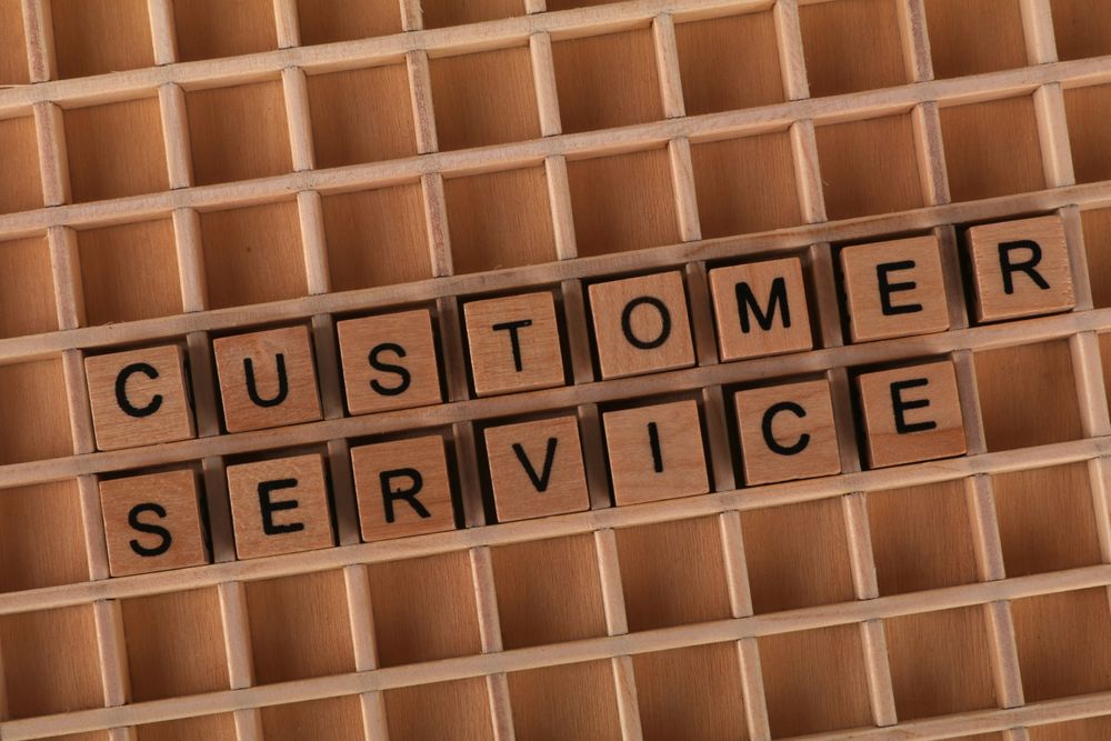 Customer service agent on a phone call, a call from debt collectors