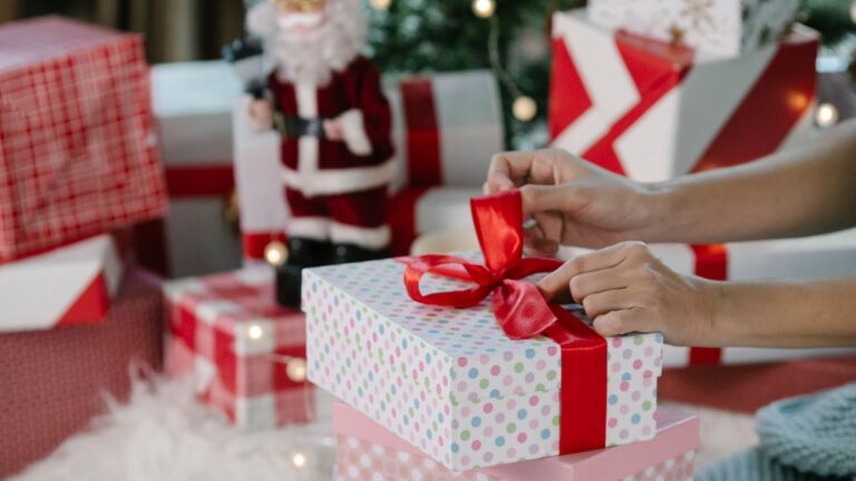 Wrapped Christmas gifts and festive decorations