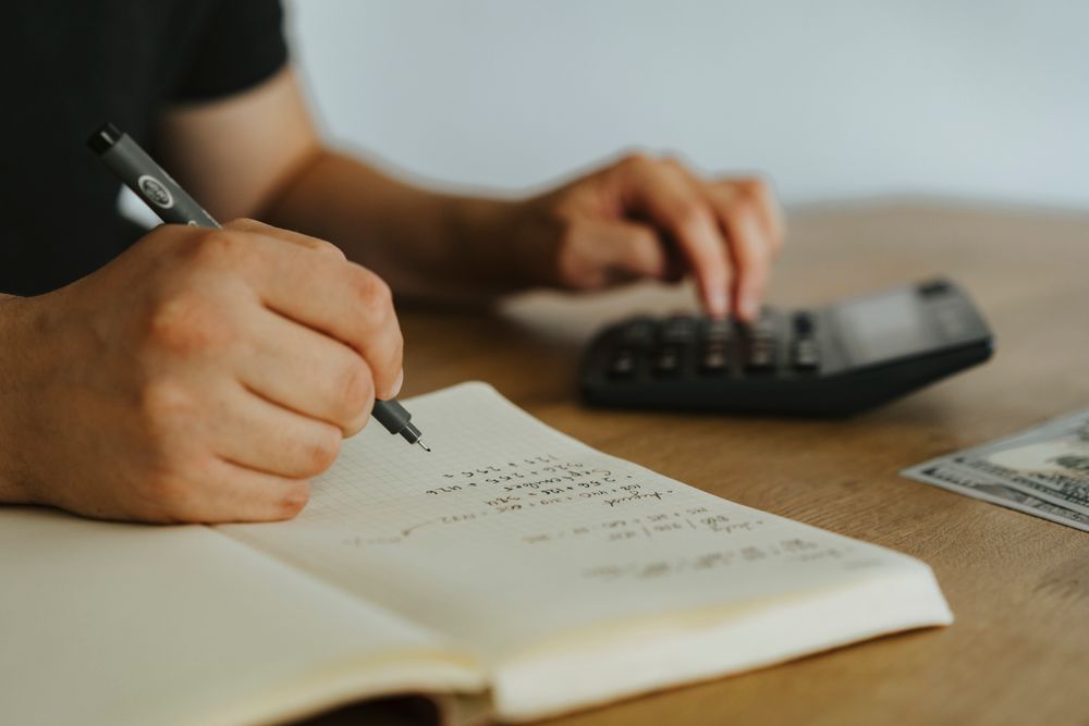 Notebook and charts used for financial planning