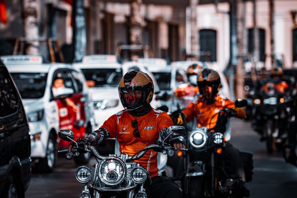 Delivery driver with a parcel, gig work like this is why e-hailing loans depend on bank statements