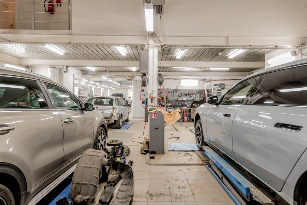 Mechanic repairing a car in a workshop