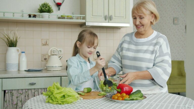 Family cooking and eating a meal at home