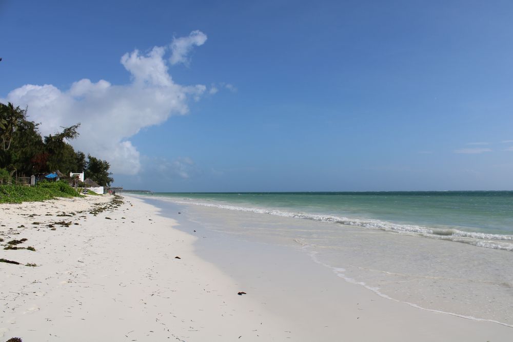 Beach holiday with sea and sand, a family on the road within their Easter budget