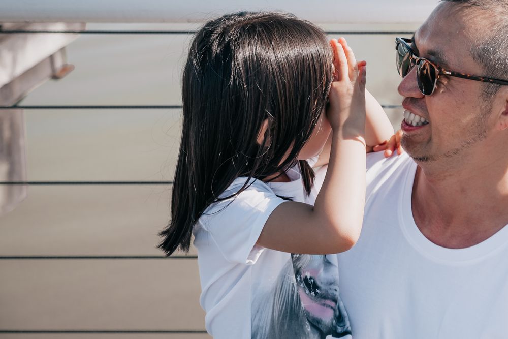 Father with his child, a father enjoying a day planned on a Father's Day budget
