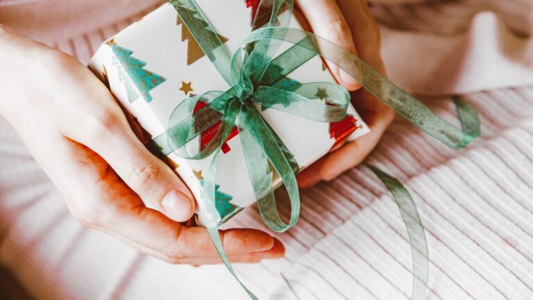 Wrapped Christmas gifts and festive decorations