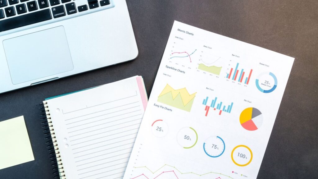 Notebook and charts used for a financial check-up