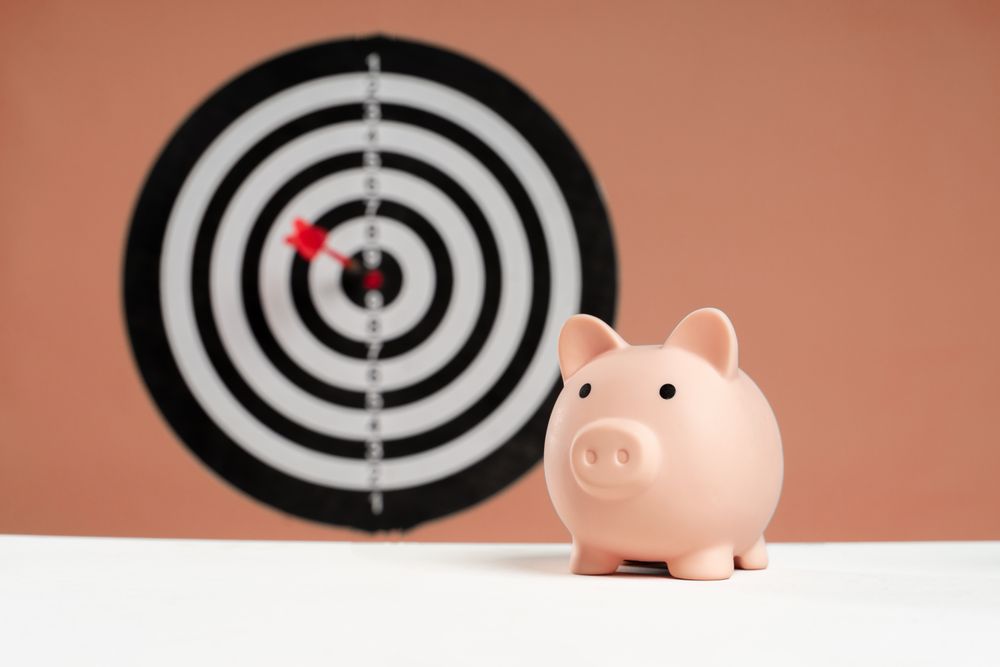 Financial goals and notes on a desk, the preparation that improves your chances when guaranteed approval loans are advertised