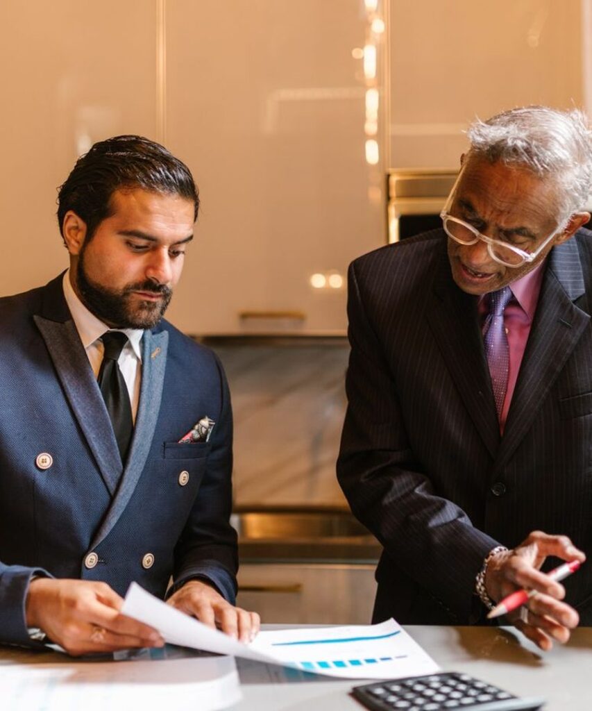 Financial adviser reviewing a loan affordability chart with a client