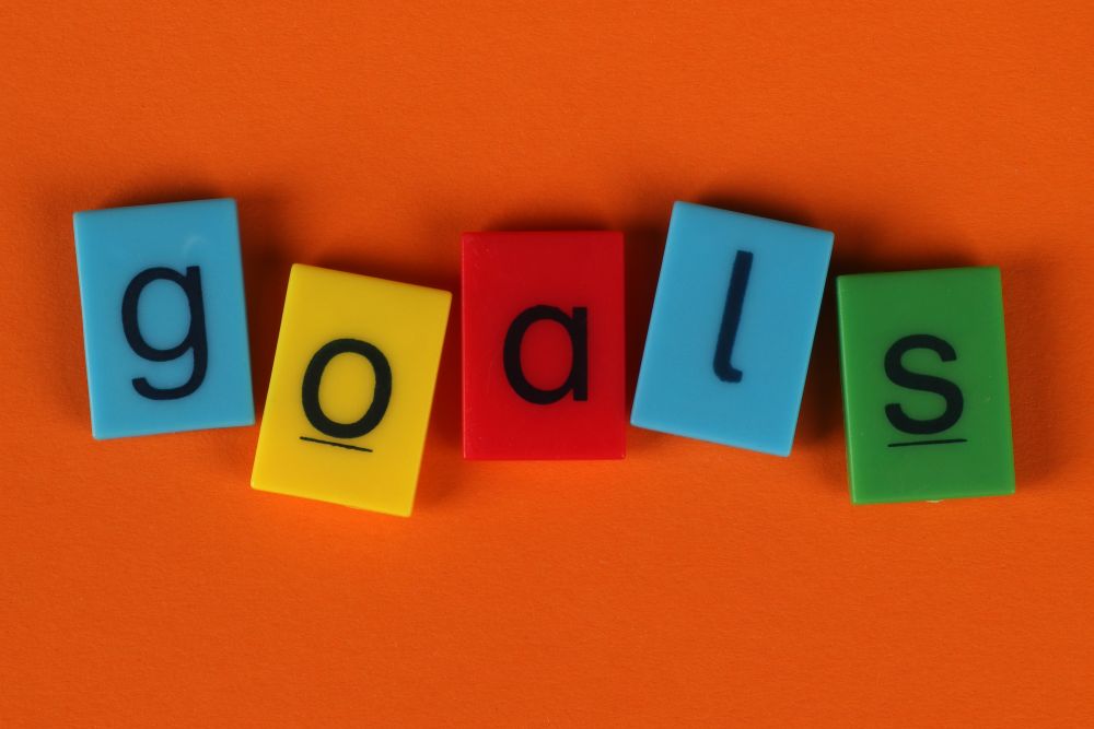 Goals written in a notebook, the 90-day plan to improve your credit score