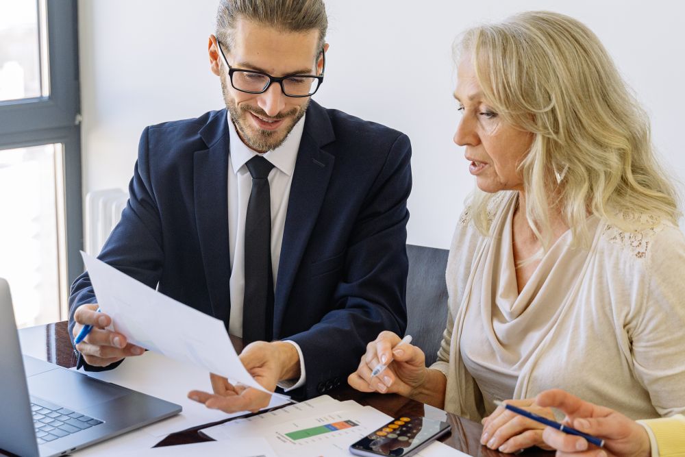 Client meeting with a financial adviser, planning how to improve your credit score