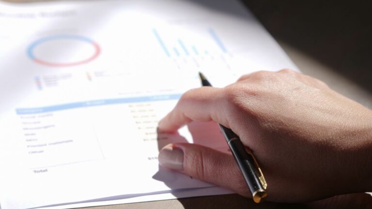 Financial chart and report on a desk showing interest rates