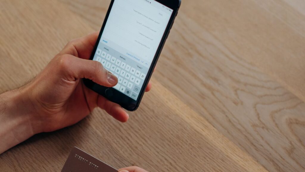 Person using a banking app on a smartphone