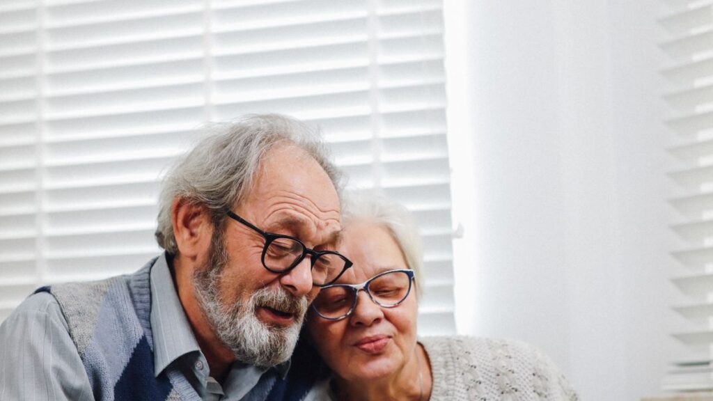 Retired couple spending time together at home
