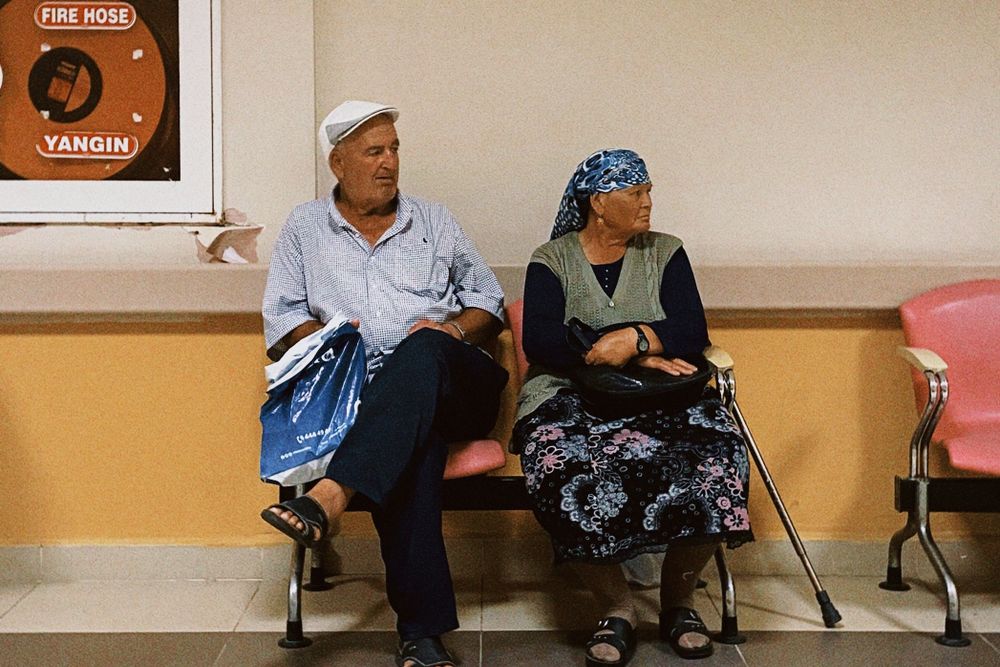 Hospital staff and patient, where medical loans may be needed
