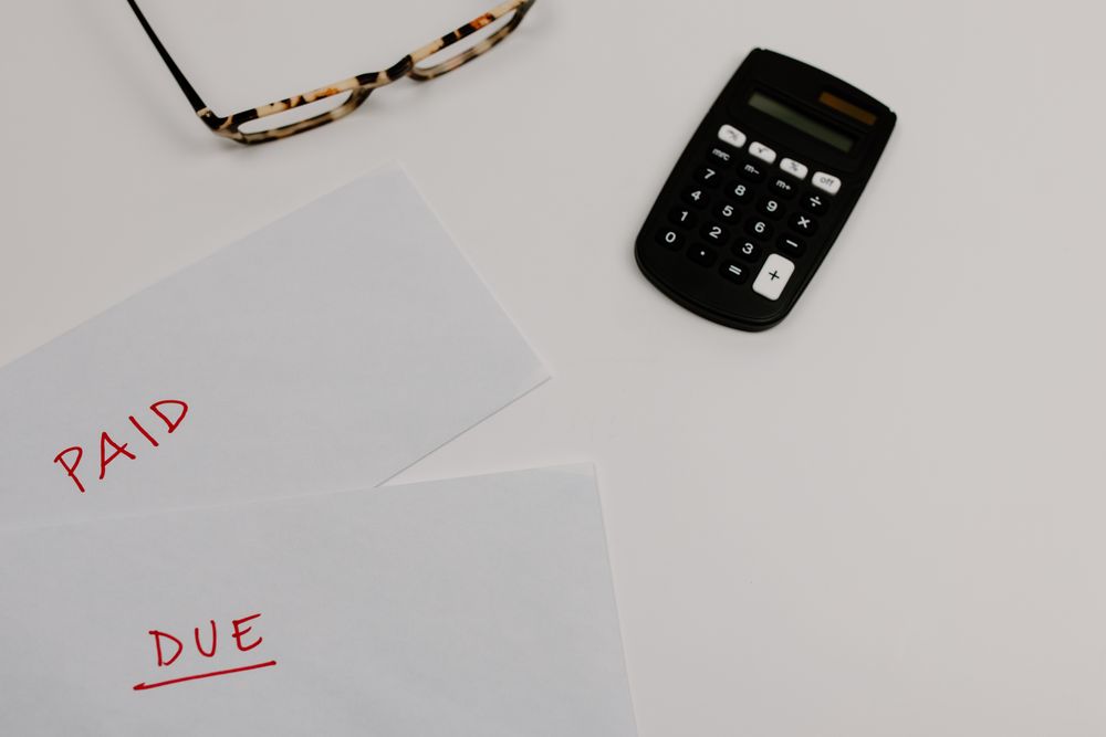 Invoices and paperwork being reviewed