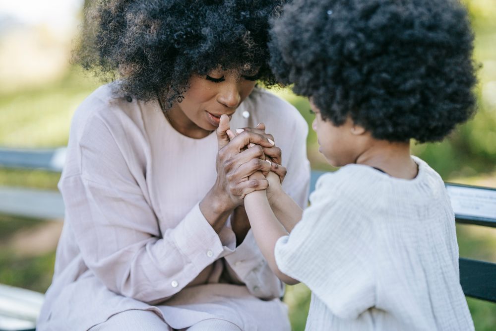 Mother with her child, a family celebrating on a Mother's Day budget