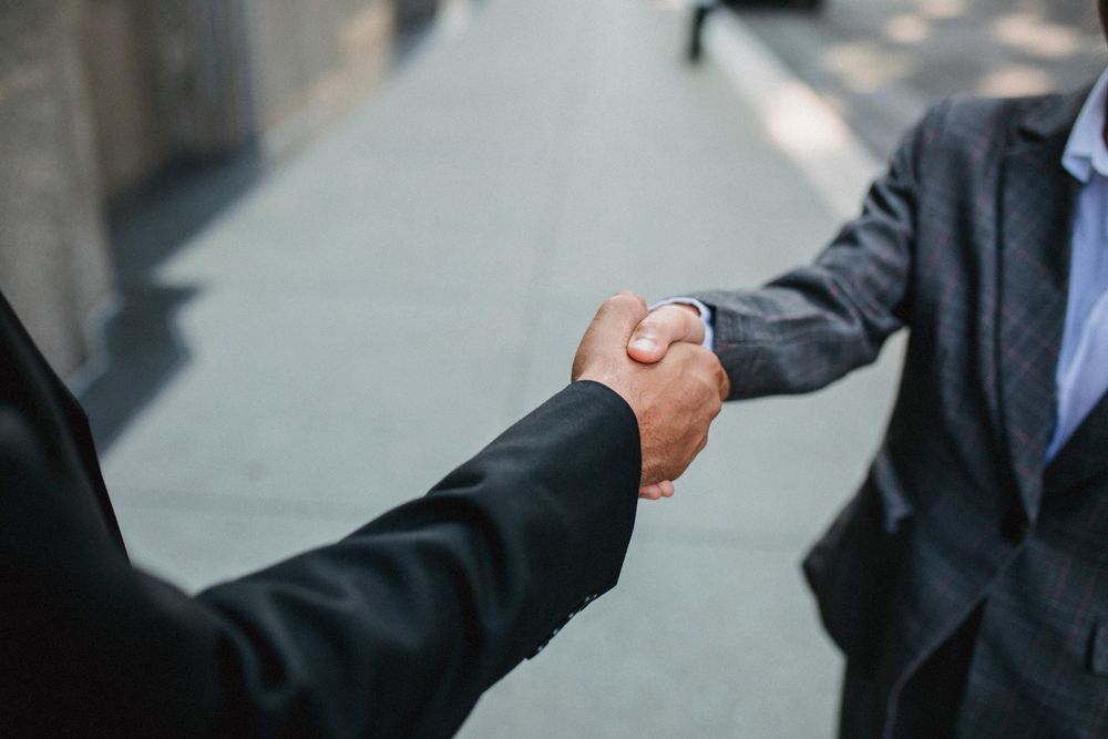 Handshake over an agreement, the agreement that the National Credit Act protects