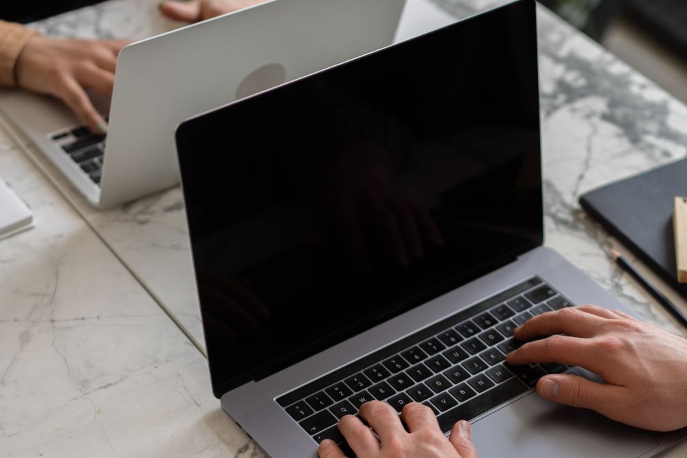 Laptop and online security warning on screen, an online security warning for online loan scams