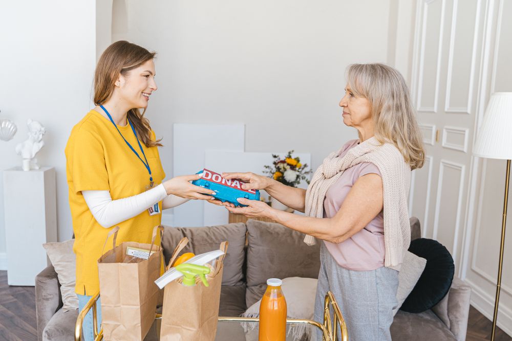 Hands offering help and support, the kind of support to ask for instead of payday loans under debt review