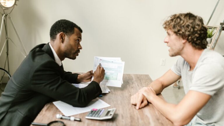 People meeting an adviser to talk about money