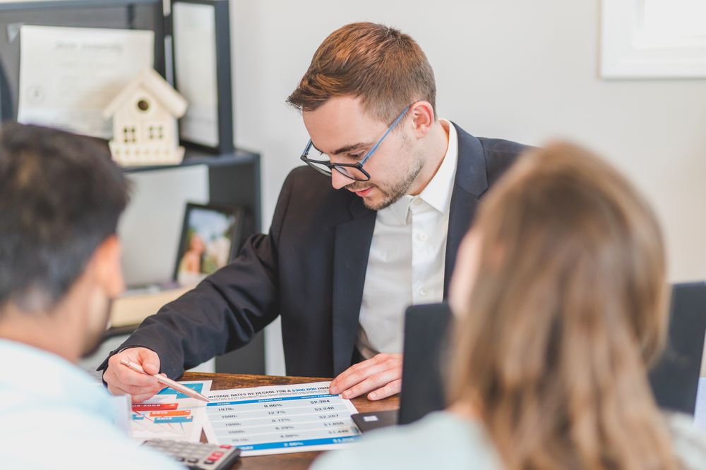 Loan paperwork being reviewed with an adviser, the affordability check that reckless lending skips