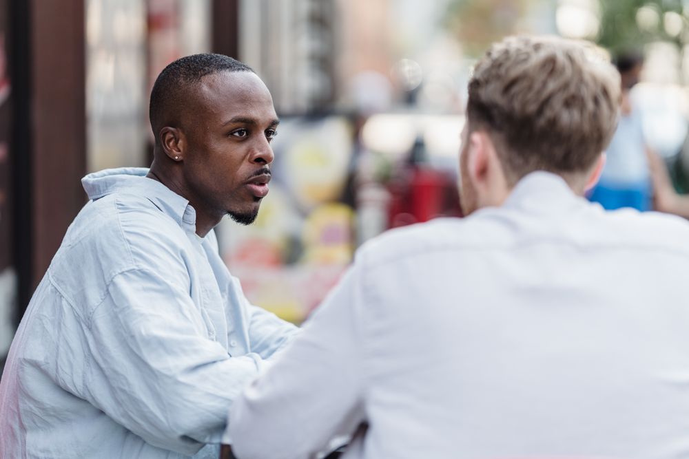 Two people having a serious conversation