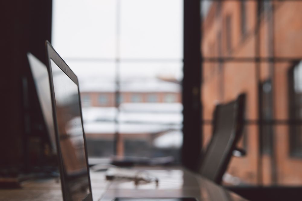 Empty office desks after job losses, empty desks after retrenchment