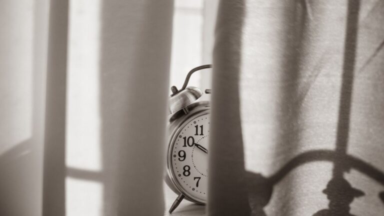 Clock and hourglass representing fast loan decisions