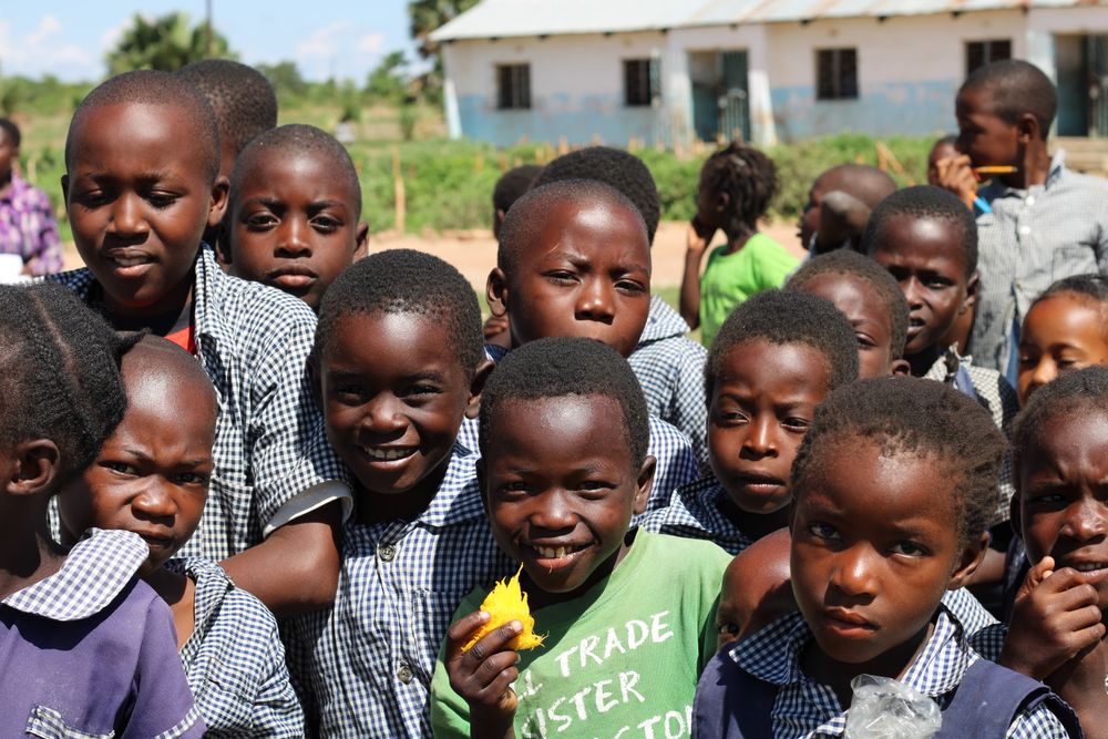School children in uniform, a child ready for school after saving for school fees