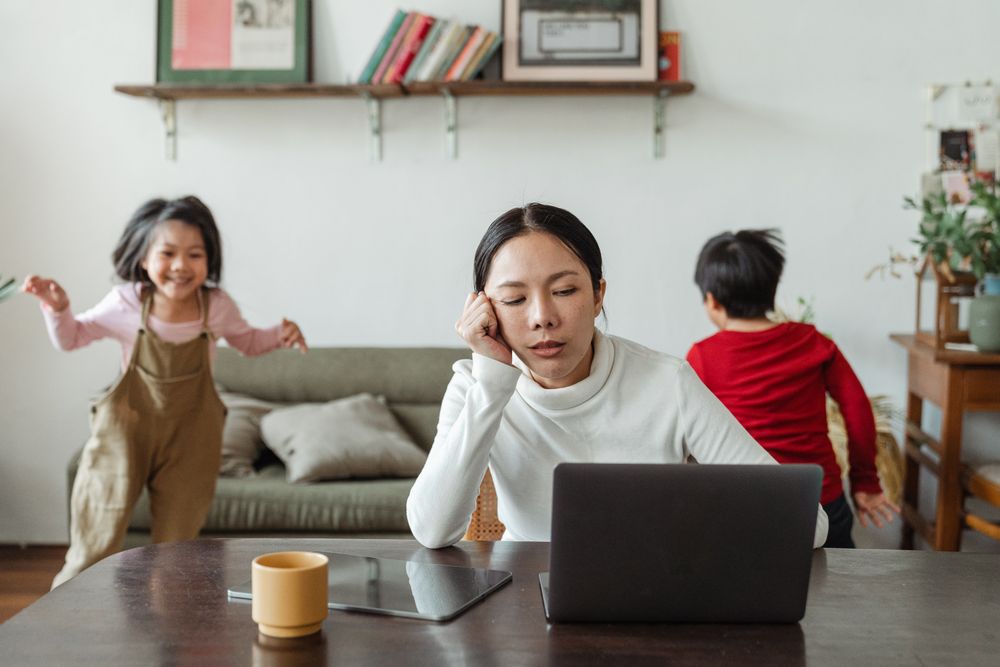 Person worried while going through bills at home, the moment a section 129 notice arrives