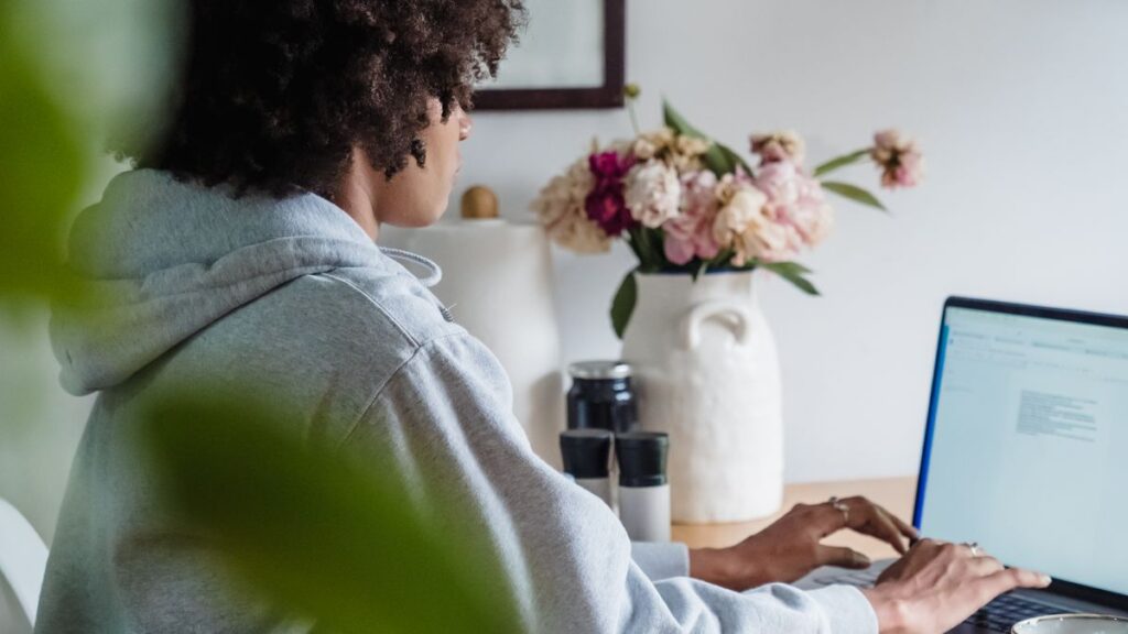 Person working on a laptop at home