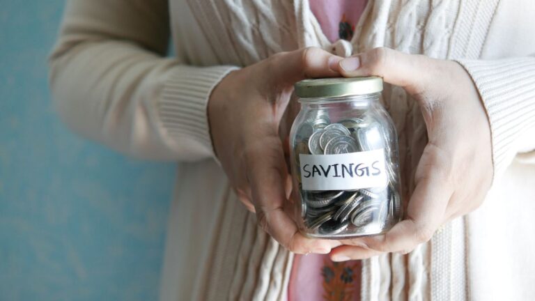 Savings jar and a savings tracker