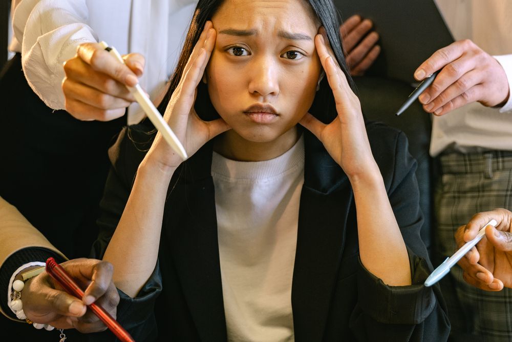 Person worried while going through bills at home, the moment to slow down before taking urgent cash loans