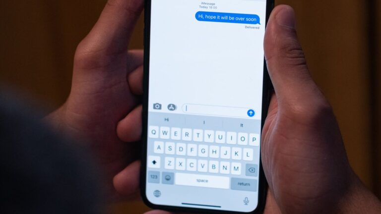 Person reading messages on a smartphone